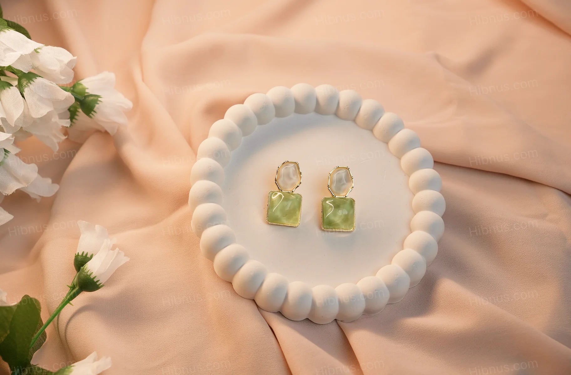 Asymmetrical diamond-shaped earrings